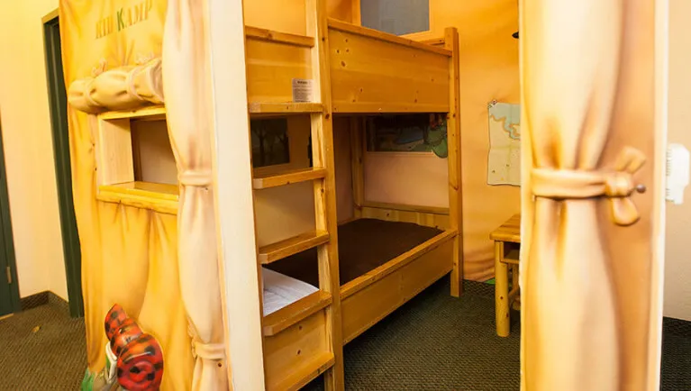 The bunk beds in the accessible KidKamp Suite