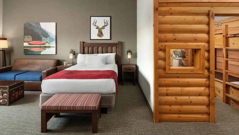 The bed and indoor cabin with bunk beds in the KidCabin Suite(balcony/patio)