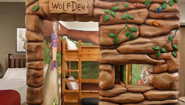 The bunk beds inside the Wolf Den Suite(balcony/patio)
