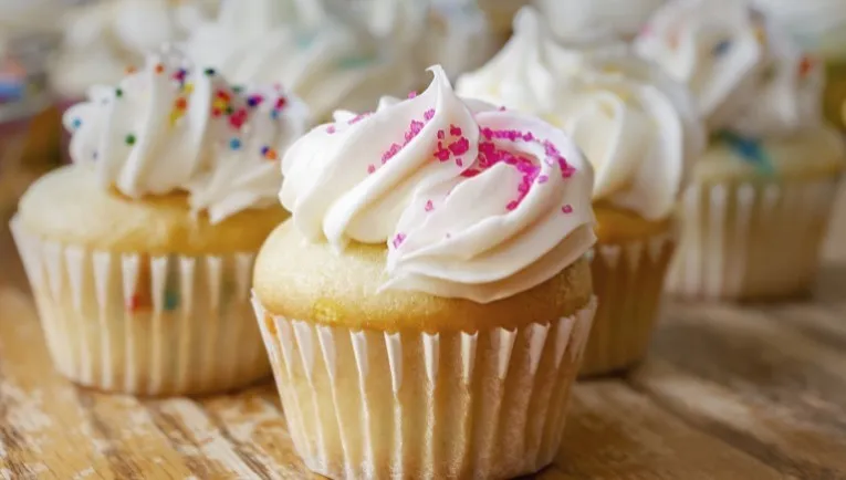 A closeup of cupcakes with sprinkles 