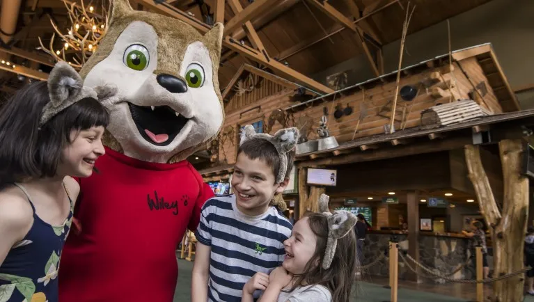 The Great Wolf characters in the lobby of a Great Wolf Lodge indoor water park and resorts.
