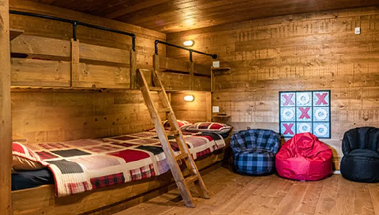 The bunk beds view of the Semi Detached Timber Wolf Cottage 