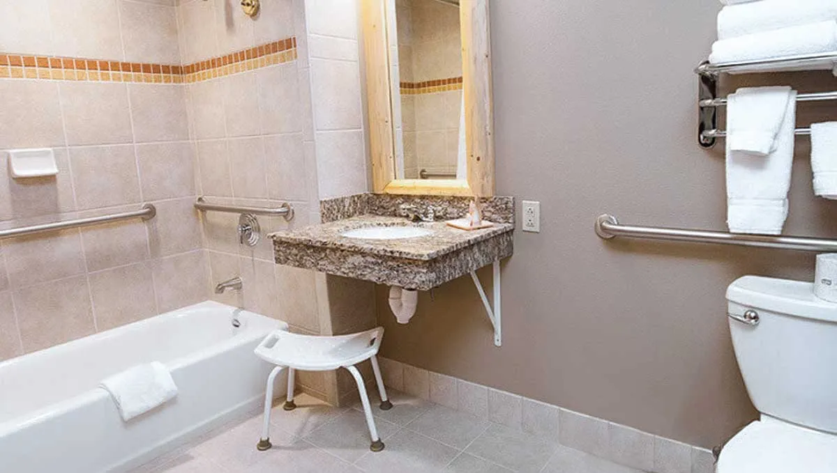 The bathroom in the Family Fireplace Suite (Accessible Bathtub)